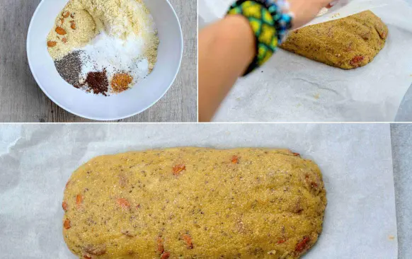 Všechny suché ingredience jsem smíchala v misce dohromady. V kastrůlku jsem rozpustila máslo a přimíchala ho do suchých ingrediencí. Následně jsem přidala rozkvedlaná vejce. Lžící jsem vypracovala v těsto. Těsto jsem přesunula na pečící papír, kterým jsem těsto obalila a pod pečícím papírem vytvořila šišku (mé ruce tak zůstaly čisté